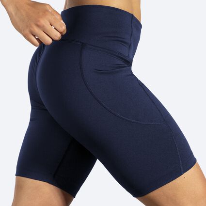 Movement angle (treadmill) view of Brooks Moment 8" Short Tight for women