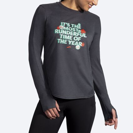 Model angle (relaxed) view of Brooks Run Merry Run Dist. Graphic LS for women