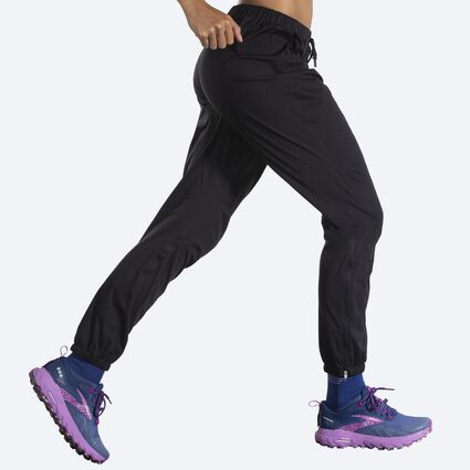 Movement angle (treadmill) view of Brooks High Point Waterproof Pant for women