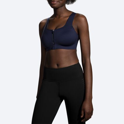 Model angle (relaxed) view of Brooks Dare Zip Run Bra for women