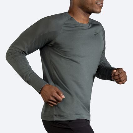 Movement angle (treadmill) view of Brooks Notch Thermal Long Sleeve for men