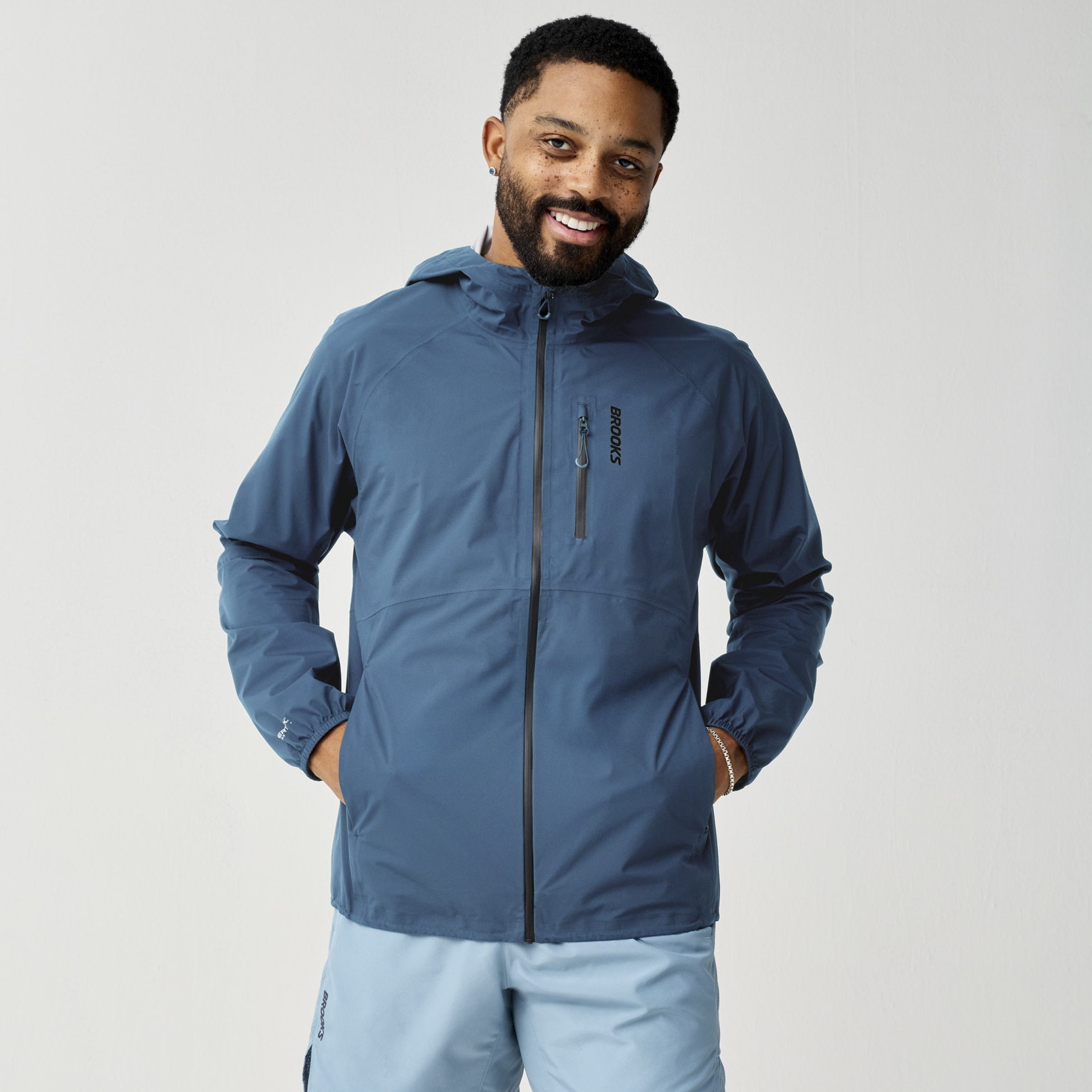 Brooks Running Men's Canopy Waterproof Jacket In Blue