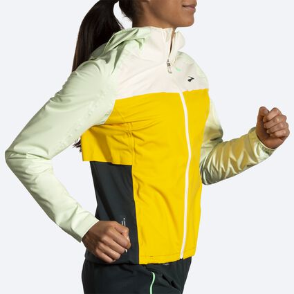 Movement angle (treadmill) view of Brooks High Point Waterproof Jacket for women