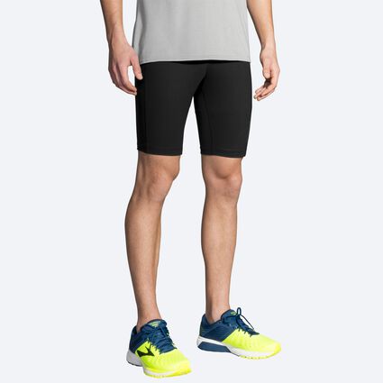 Model angle (relaxed) view of Brooks Greenlight 9" Short Tight for men