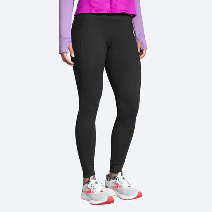 Model angle (relaxed) view of Brooks Momentum Thermal Tight for women