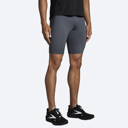 Model angle (relaxed) view of Brooks Source 9" Short Tight for men
