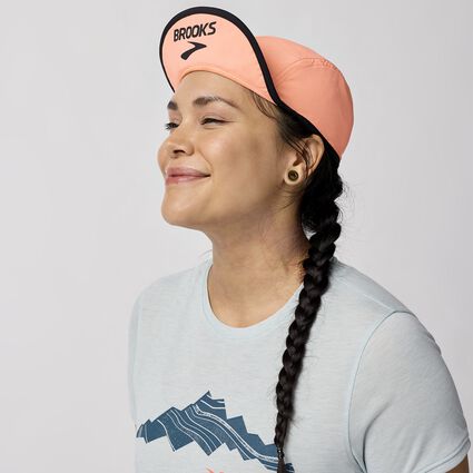 Model (front) view of Brooks Lightweight Packable Hat 2.0 for unisex