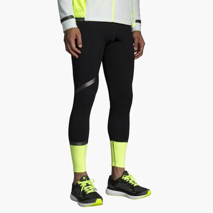 Model angle (relaxed) view of Brooks Carbonite Tight for men