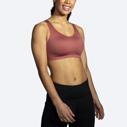 Model angle (relaxed) view of Brooks Dare Scoopback Run Bra for women