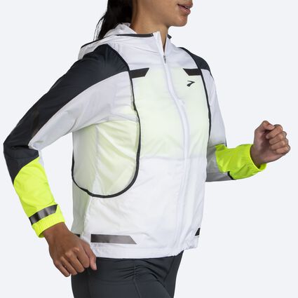 Movement angle (treadmill) view of Brooks Run Visible Convertible Jacket for women