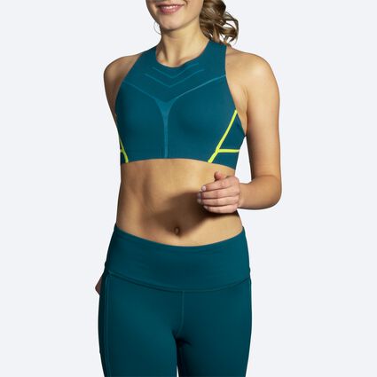 Model angle (relaxed) view of Brooks Dare High-Neck Run Bra for women
