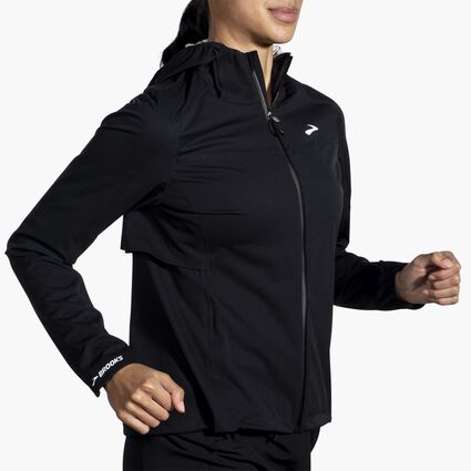 Movement angle (treadmill) view of Brooks High Point Waterproof Jacket for women