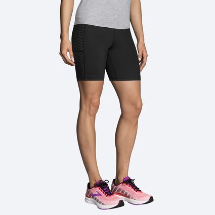 Model angle (relaxed) view of Brooks Greenlight 7" Short Tight for women