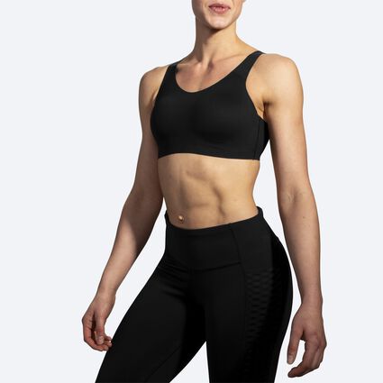 Model angle (relaxed) view of Brooks Dare Scoopback Run Bra for women