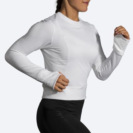 Movement angle (treadmill) view of Brooks Notch Thermal Long Sleeve for women