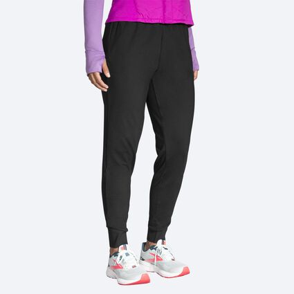 Model angle (relaxed) view of Brooks Momentum Thermal Pant for women