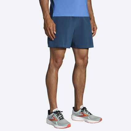 Model angle (relaxed) view of Brooks Run Within 7" Linerless Short for men