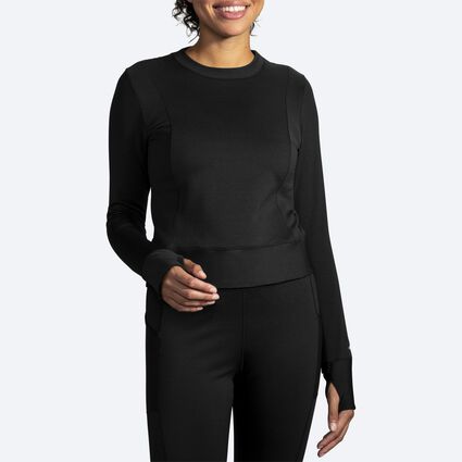 Model angle (relaxed) view of Brooks Notch Thermal Long Sleeve for women