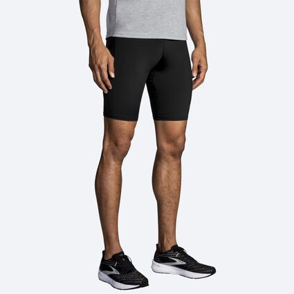 Model angle (relaxed) view of Brooks Source 9" Short Tight for men