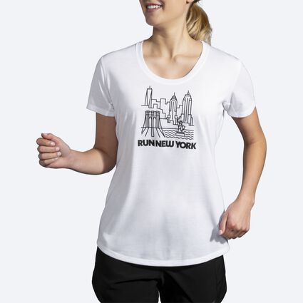 Model angle (relaxed) view of Brooks Distance Graphic Tee for women