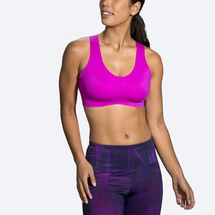 Model angle (relaxed) view of Brooks Dare Crossback Run Bra for women