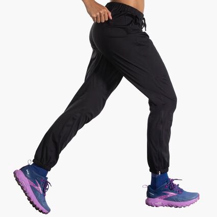 Movement angle (treadmill) view of Brooks High Point Waterproof Pant for women