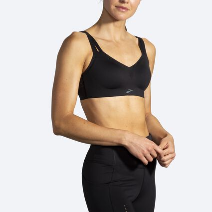 Model angle (relaxed) view of Brooks Strappy Sports Bra for women