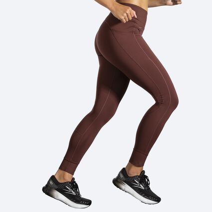 Movement angle (treadmill) view of Brooks Momentum Thermal Tight for women