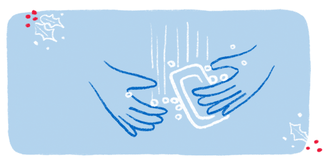 An illustration of a pair of hands lathering up with a bar of soap.