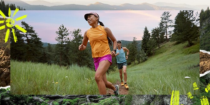 A woman and a man running on trail