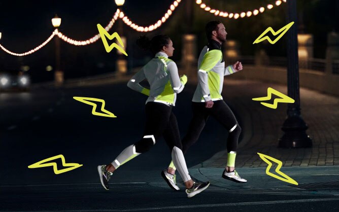 Two runners with illustrated lightning bolts