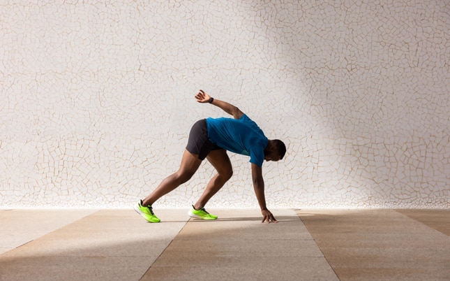 Male runner ready to sprint