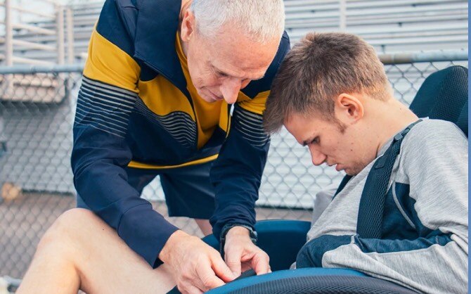 Peter preparing with Brandon for a run