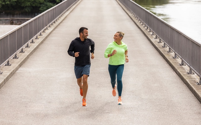 Two runners running together