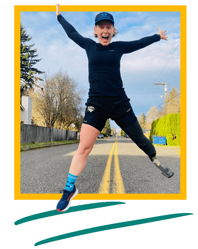 Ver Kuilen, founder of the nonprofit Forrest Stump, jumping for joy on an empty street