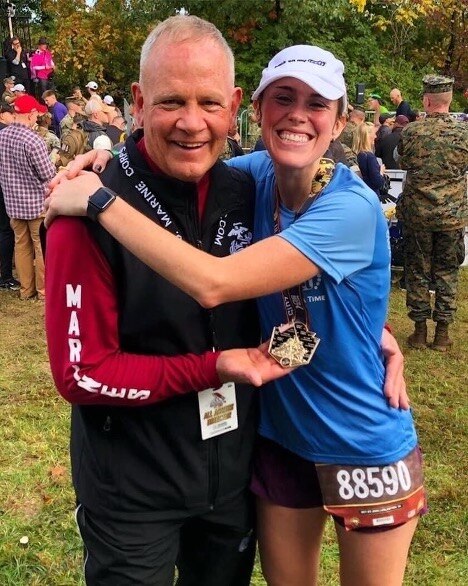 Runners smiling after a marathon
