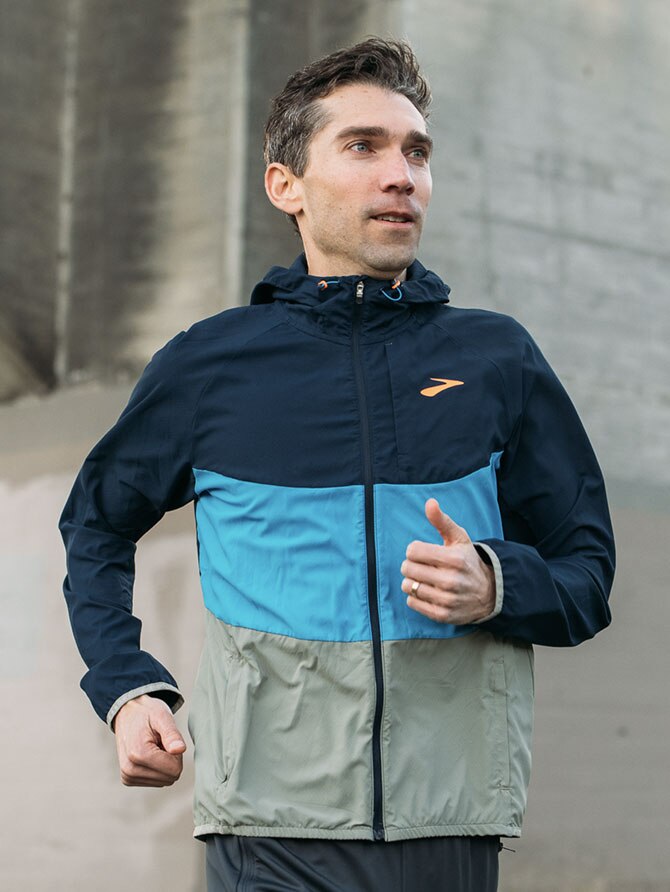 Mike Orton running in a Canopy Jacket