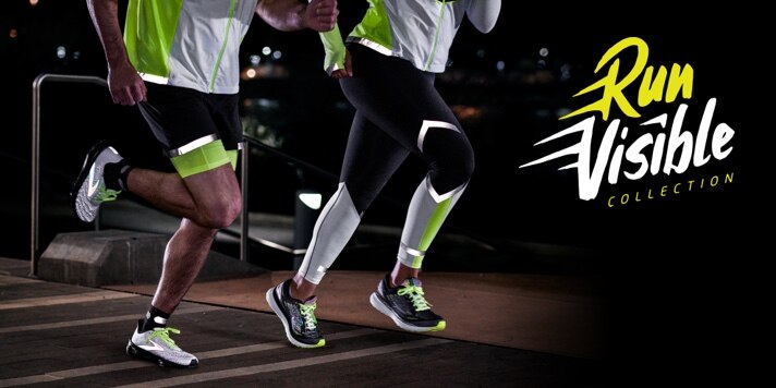 Two runners in full run visible apparel