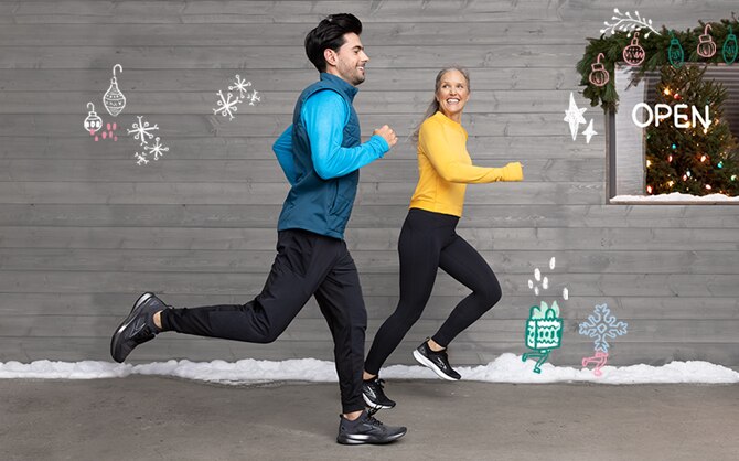 Two people running in front of a shop