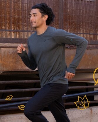 man running in a grey notch thermal long sleeve