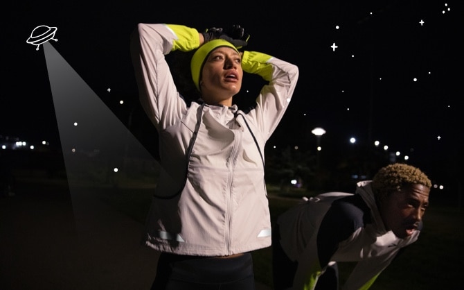 A runner lit up in the dark