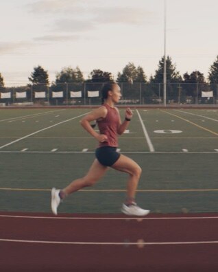 Rosalie running on a track
