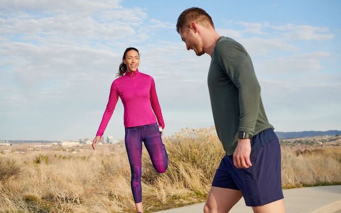 Two runners in a valley