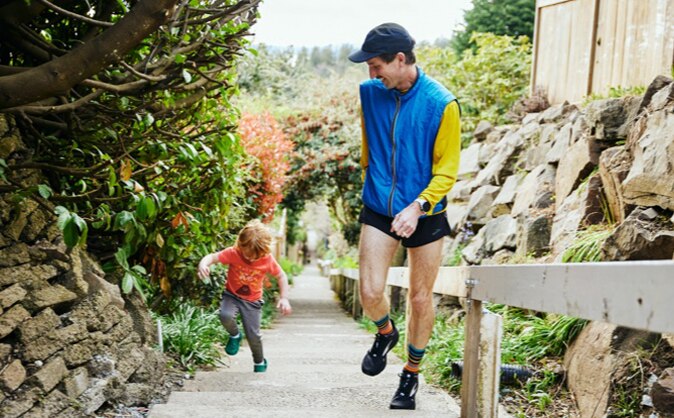 A man running with his child