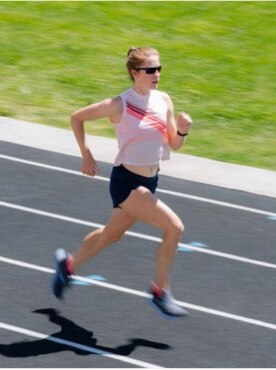 Women sprinting down a track