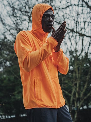 Runner rubbing his hands together