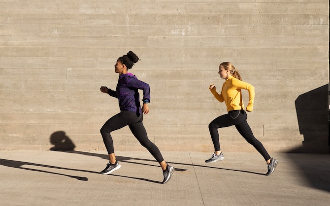 Two runners mid stride