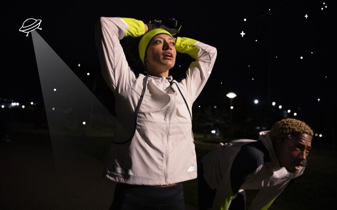 A runner lit up in the dark
