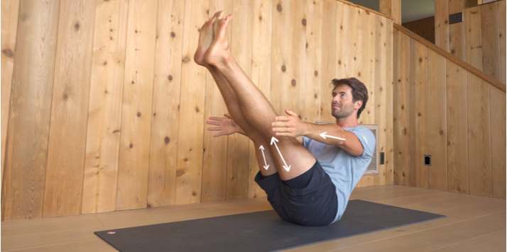 Tim Senesi doing a yoga pose 