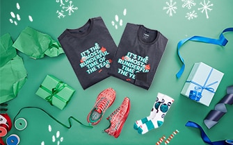 Run Merry Shirt and shoes laid down